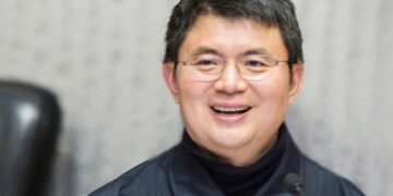 Canadian billionaire sentenced to 13-year jail term in China, by Stanley Ugagbe