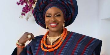 Actress Mama Rainbow prays as she celebrates 80th birthday in grand style