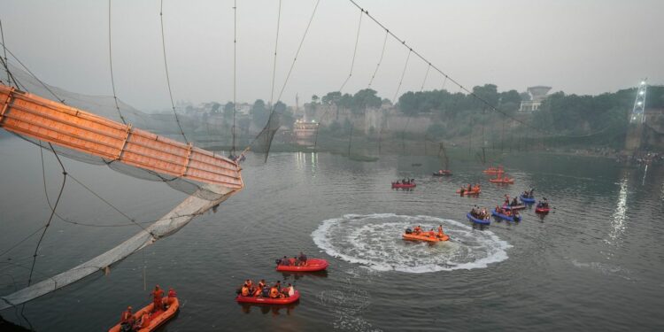 9 People Arrested After Bridge Collapses Into River in India, Killing 134 People