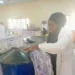 Nigerian female student converts ‘pure water’ sachets to kerosene, diesel, by Stanley Ugagbe
