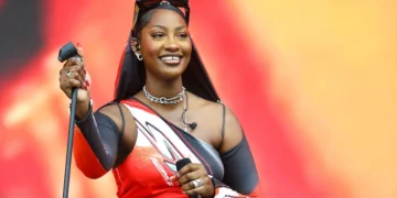 Buhari Praises Tems Over Grammy Win