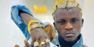 ‘This boy na agbako’ – Nigerians react as Portable tells Policemen he works for APC when they stormed his bar