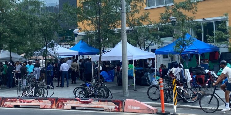 Asylum seekers moved from downtown Toronto streets to North York church