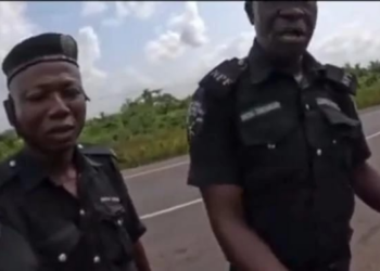 Policemen Demand Money From Foreign Female Biker In Nigeria (video)