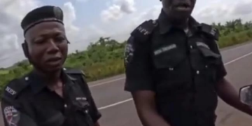 Policemen Demand Money From Foreign Female Biker In Nigeria (video)