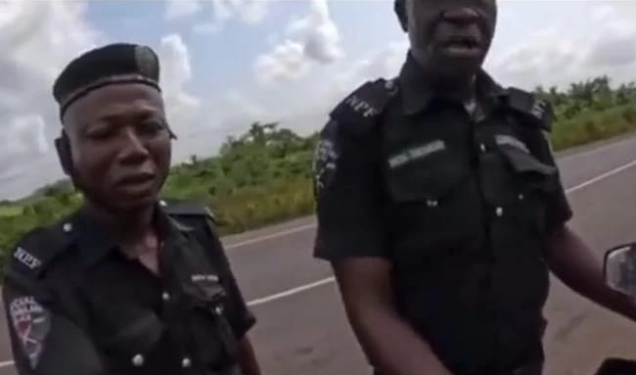 Policemen Demand Money From Foreign Female Biker In Nigeria (video)