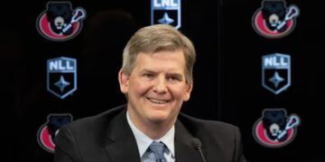GF Sports and Entertainment's Erik Baker smiles during an announcement on Feb. 21, 2024 the National Lacrosse League's New York Riptide will be moving north and becoming the Ottawa Black Bears. (Adrian Wyld/The Canadian Press)